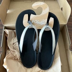 Brand new OluKai Flip Flops